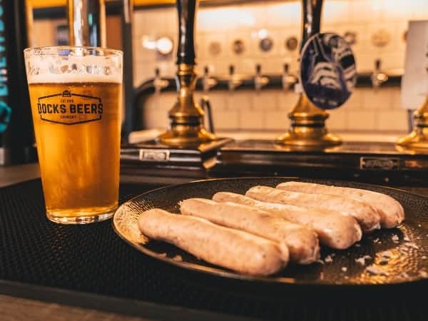 pettit sausages with a beer